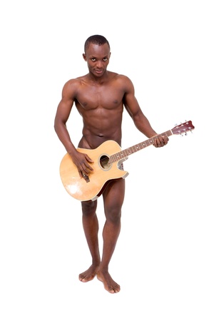 Naked man with guitar posing against isolated white backgroundの写真素材