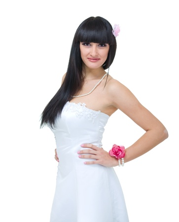 Attractive bride posing against isolated white backgroundの写真素材