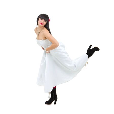 Runaway bride posing against isolated white backgroundの写真素材