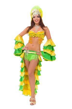 Beautiful carnival dancer standing against isolated white backgroundの写真素材