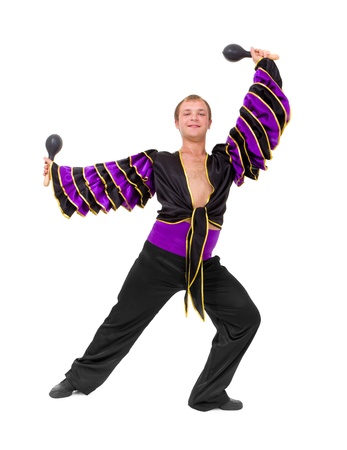 young dancer with the maracas standing on a white backgroundの写真素材