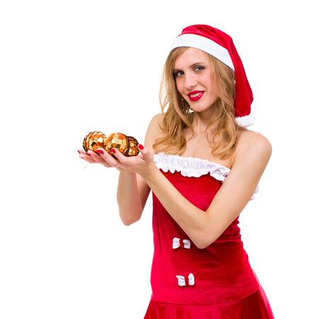 Young woman wearing santa claus clothes posing against isolated white backgroundの写真素材