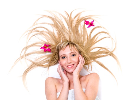 young beautiful lady with magnificent blond hairの写真素材