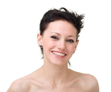 friendly smiling young woman portrait on a white backgroundの写真素材