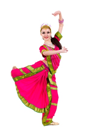 full length portrait of indian woman dancing in studio   Isolated on white background の写真素材