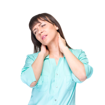 Nurse or young woman doctor having neck pain, isolated on white .の写真素材