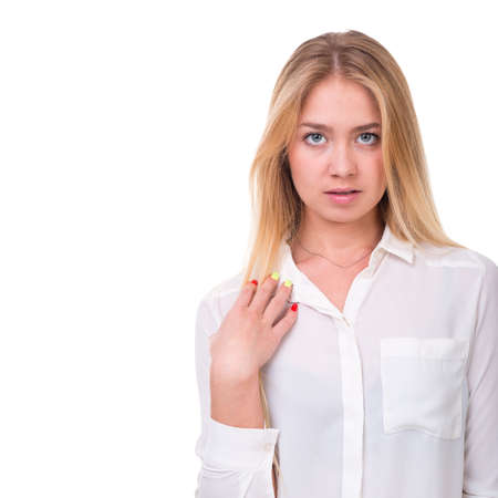 Closeup portrait of dreamy woman isolated on white studio shotの写真素材