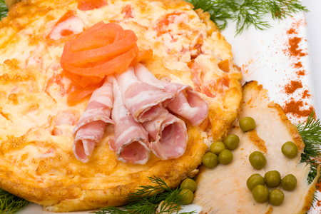 close up photo of  ham and cheese pie on white backgroundの写真素材