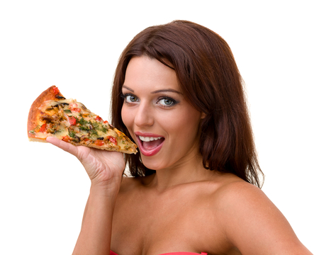 Smiling woman with big pizza isolated on a whiteの写真素材