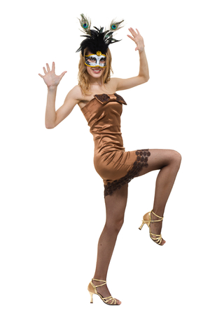 Carnival dancer woman wearing a mask dancing, isolated on white in full length.の写真素材