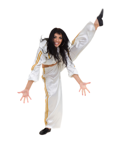 Disco dancer showing some movements against isolated whiteの写真素材