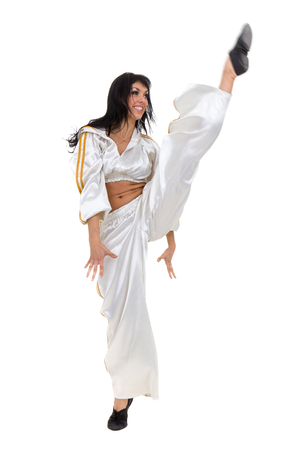 Disco dancer showing some movements against isolated whiteの写真素材