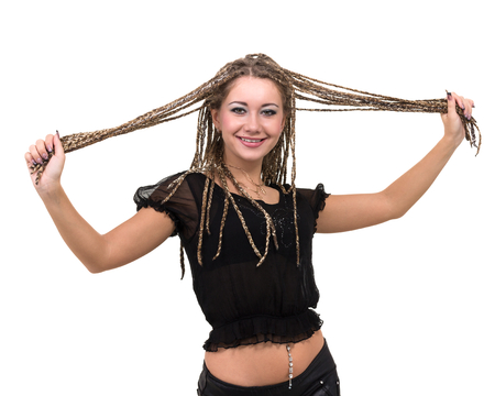 portrait of young smiling woman with dreadlocks.の写真素材