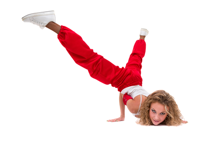 fitness woman doing exercises, isolated on white background in full length.の写真素材
