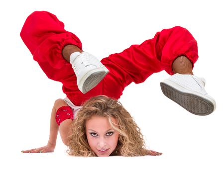 fitness woman doing exercises, isolated on white background in full length.の写真素材