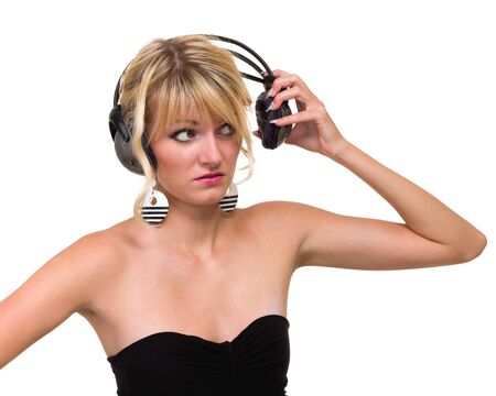attractive woman dancer with headphones, isolated on whiteの写真素材