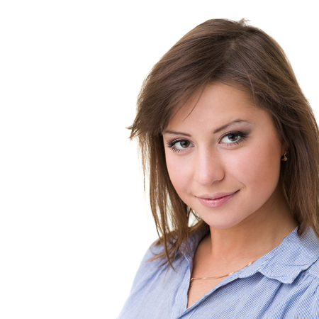 Closeup portrait of dreamy woman isolated on whiteの写真素材