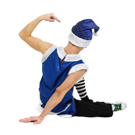 man wearing a bunny costume posing against isolated white background in full lengthの写真素材