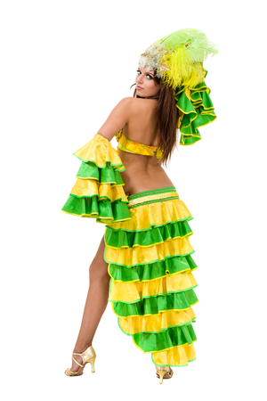 one caucasian woman samba dancer dancing isolated on white in full lengthの写真素材