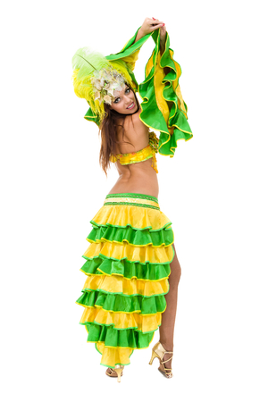 one caucasian woman samba dancer dancing isolated on white in full lengthの写真素材