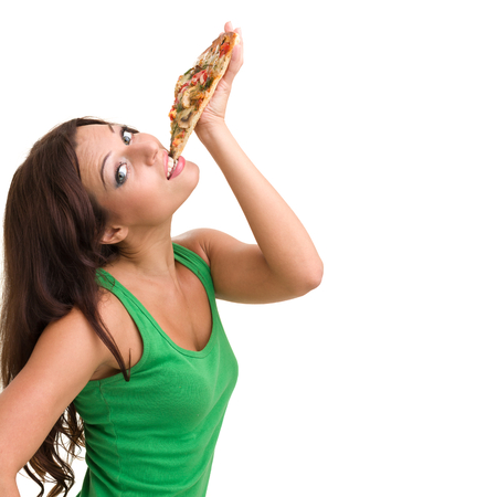 Smiling woman with big pizza isolated on a white backgroundの写真素材