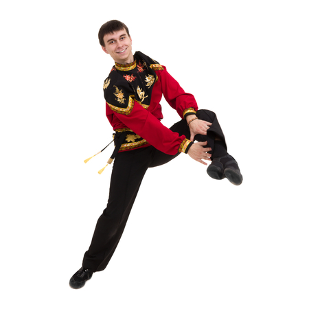 young man wearing a folk russian costume posingの写真素材