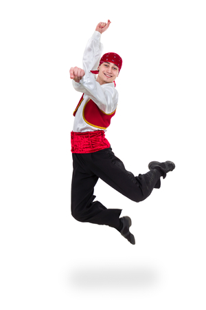 Dancing man wearing a toreador costume jumping. Isolated on white in full length.の写真素材