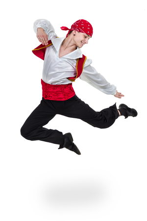 Dancing man wearing a toreador costume jumping. Isolated on white in full length.の写真素材