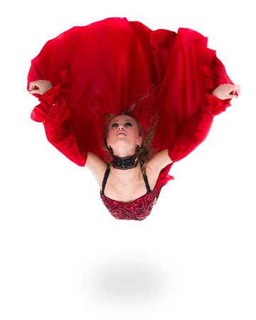 young flamenco woman jumping, isolated in full body on whiteの写真素材