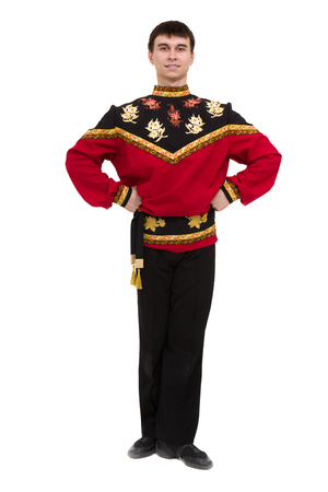 young man wearing a folk russian costume posingの写真素材