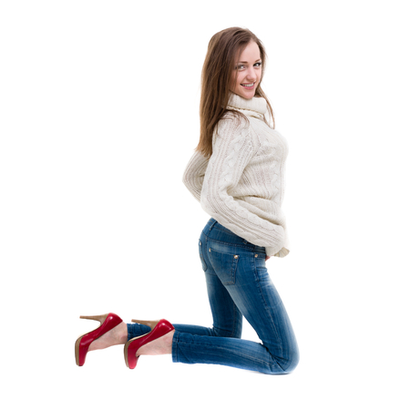Pretty woman dressed for autumn, isolated on whiteの写真素材