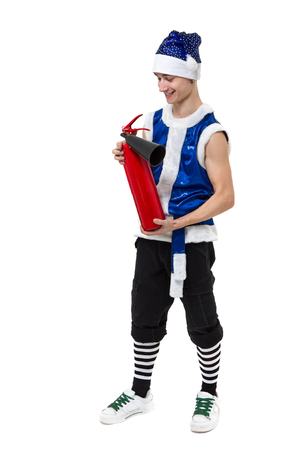 Christmas man in blue santa clothes with fire extinguisherの写真素材