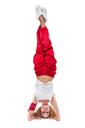 fitness woman doing exercises, isolated on white background in full length.の写真素材