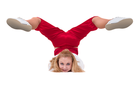 fitness woman doing exercises, isolated on white background in full length.の写真素材