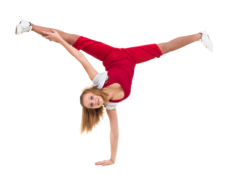 fitness woman doing exercises, isolated on white background in full length.の写真素材