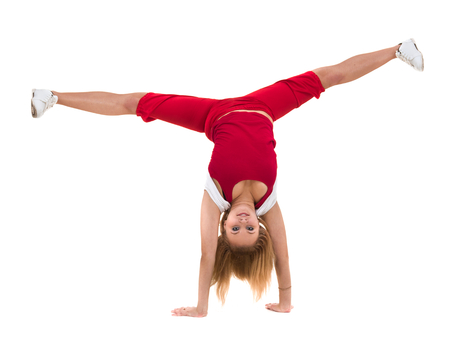 fitness woman doing exercises, isolated on white background in full length.の写真素材