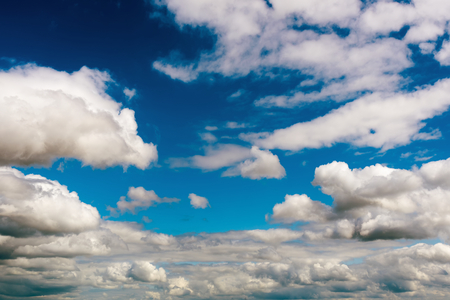 Fantastic white clouds against blue skyの写真素材
