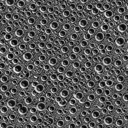 seamless looped air bubbles on black backgroundの写真素材