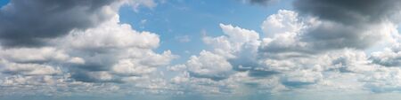 Fantastic clouds against blue sky, panoramaの写真素材