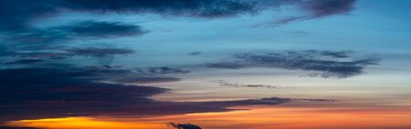 Fantastic thunderclouds at sunriseの写真素材