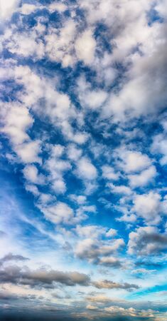 Fantastic soft clouds against blue sky, natural composition - panoramaの写真素材