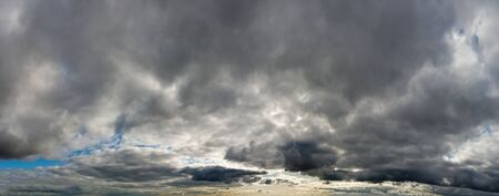 Fantastic dark thunderclouds, sky panoramaの写真素材