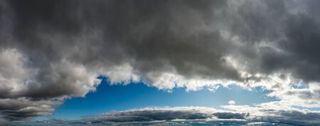 Fantastic dark thunderclouds, sky panoramaの写真素材