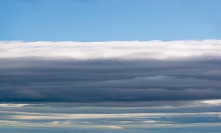 Fantastic soft clouds against blue sky, natural composition - panoramaの写真素材