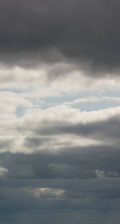 Fantastic clouds against blue sky, panoramaの写真素材