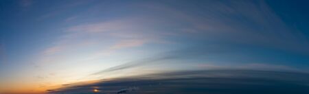 Fantastic clouds against blue sky, panoramaの写真素材