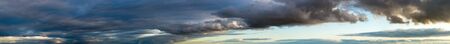 Fantastic dark thunderclouds, sky panoramaの写真素材