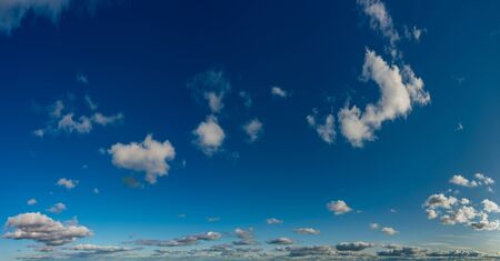 Fantastic clouds against blue sky, panoramaの写真素材