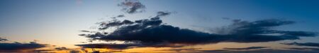 Fantastic clouds against blue sky, panoramaの写真素材