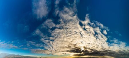 Fantastic dark thunderclouds at sunriseの写真素材